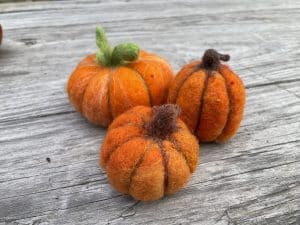 Needle felted pumpkins.